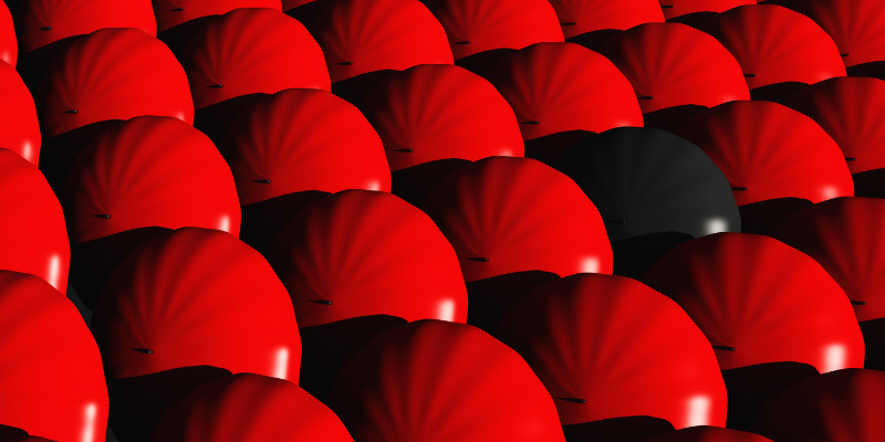 Image de parapluies rouges collés ensemble et remplissant tout l'espace.
